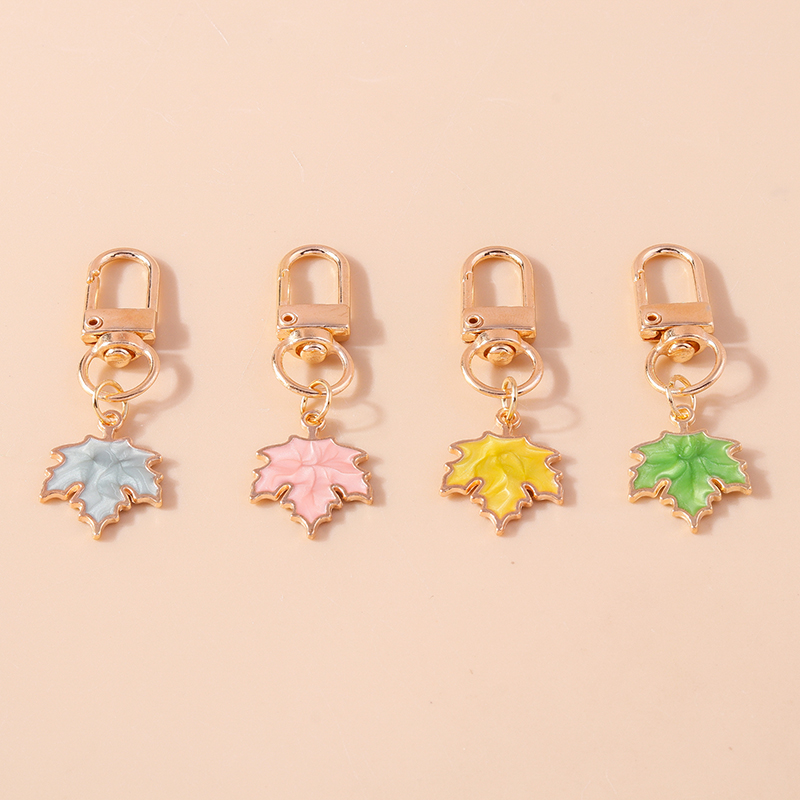 المينا كندا مابل ليف المفاتيح  - مراجعة Women'S Accessories Canada وسعره